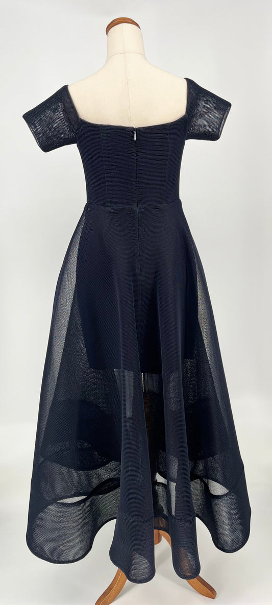 Navy blue dress on a mannequin against a white background