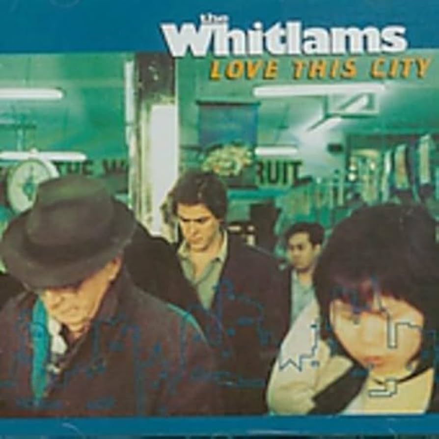 Music CD cover for 'Love This City' by The Whitlams featuring the lead singer and other people in a city setting.
