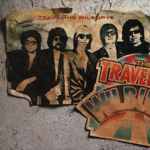 Music CD cover of 'The Traveling Wilburys' with band members' portraits on a textured background.