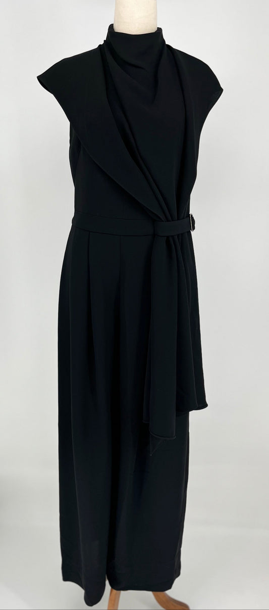 Black jumpsuit on a mannequin against a white background