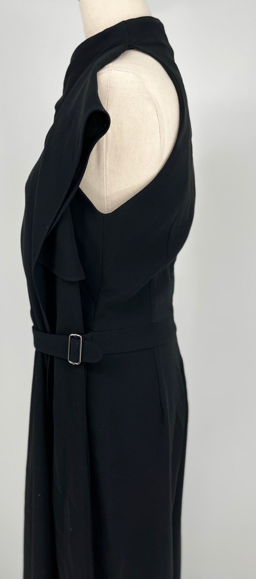 Black sleeveless jumpsuit on a mannequin against a white background