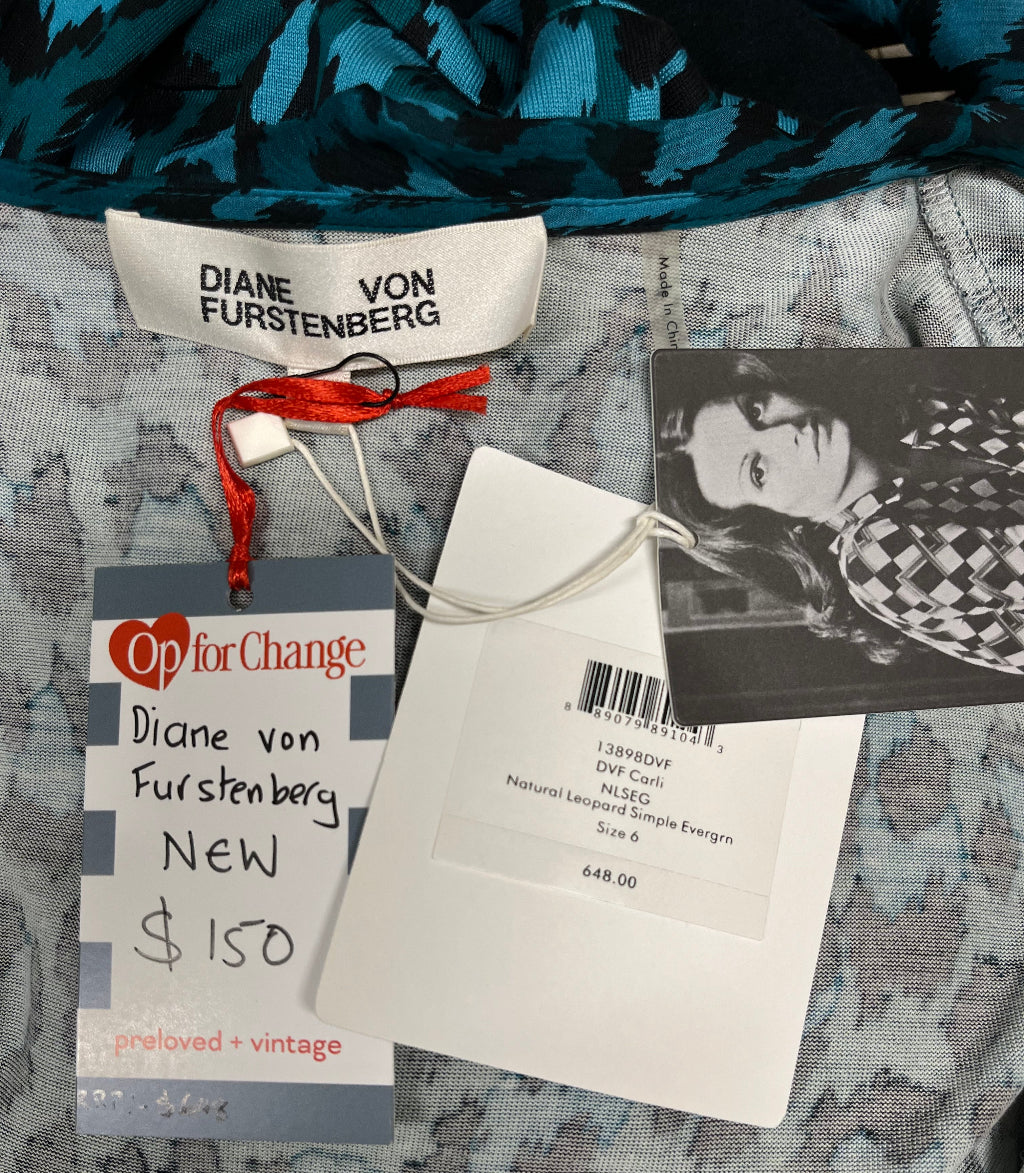 Clothing with tags and labels on a textured surface