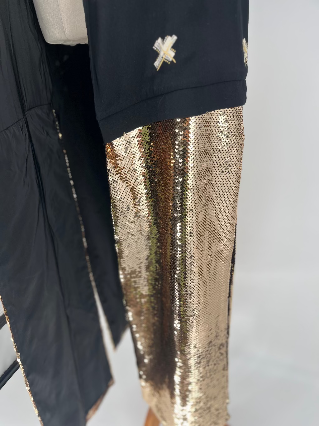 Gold sequin trim on jacket 