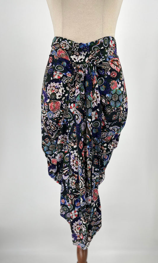 Floral patterned skirt on a mannequin against a white background