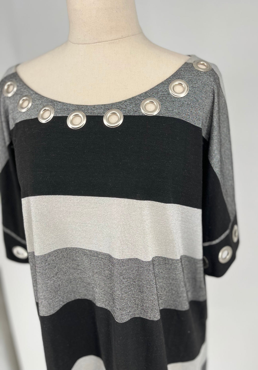 Simona striped dress close up .