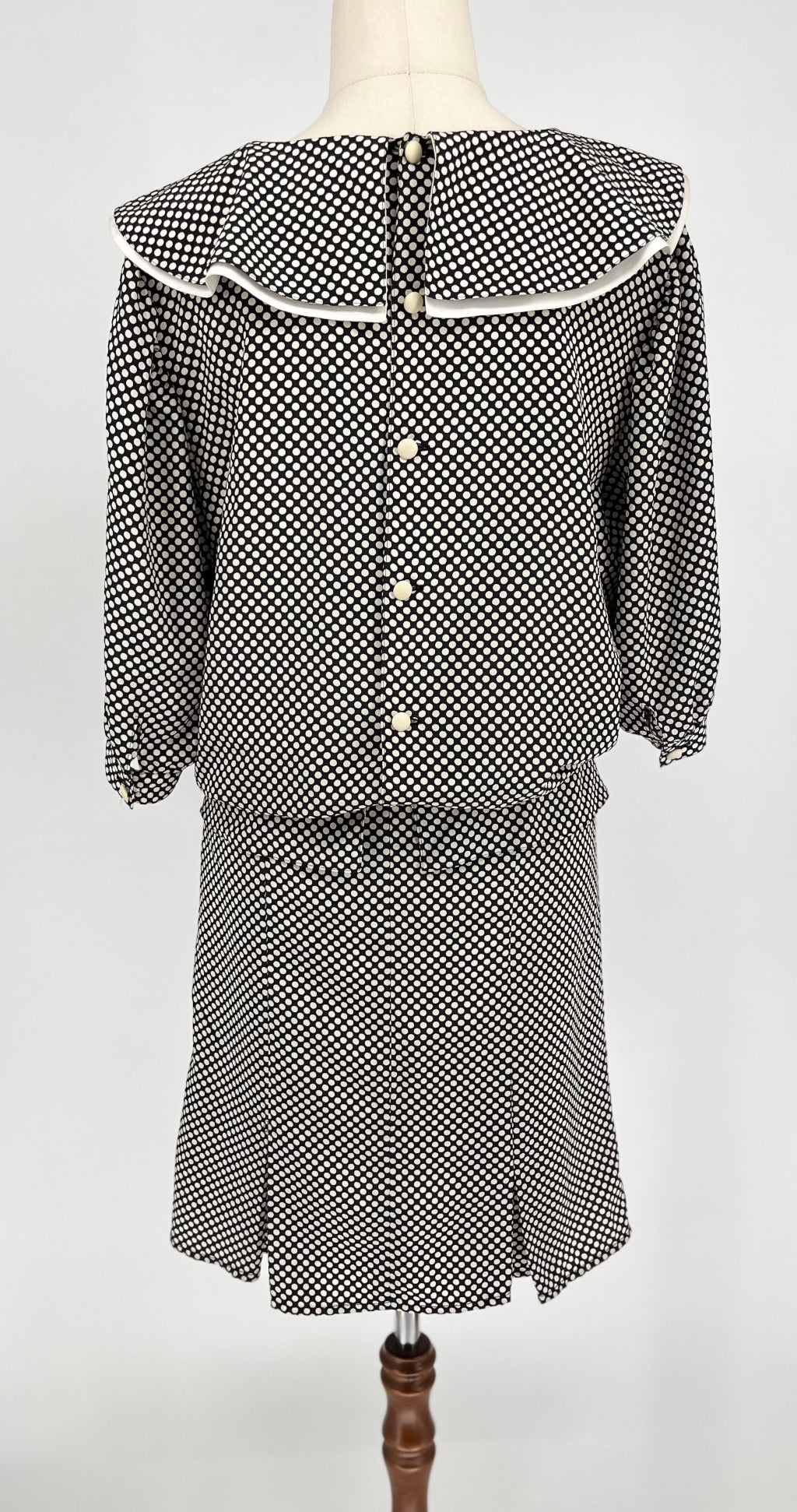 Black and white spotty dress on mannequin