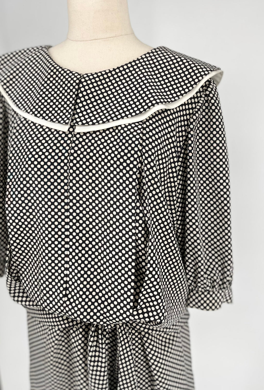 Black and white spotty dress on mannequin