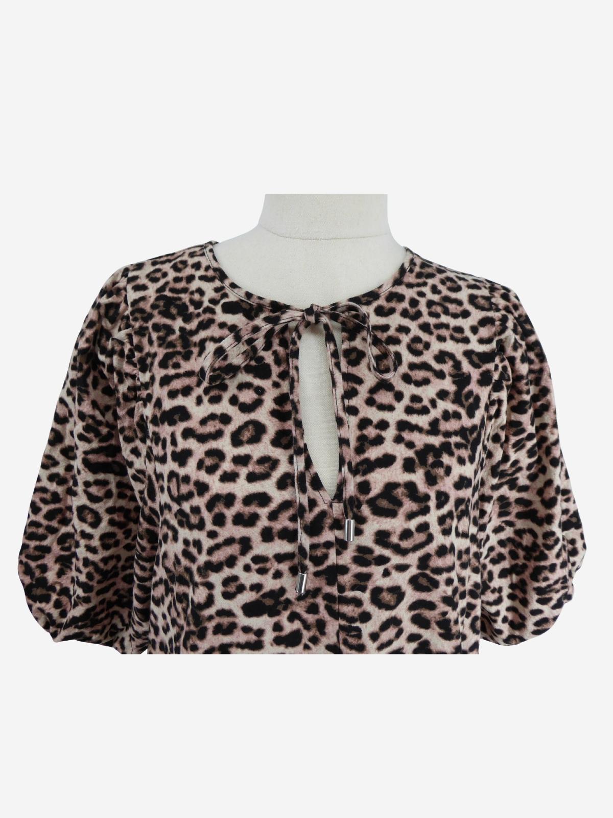 Decjuba dress detail showing the leopard print design and front keyhole design