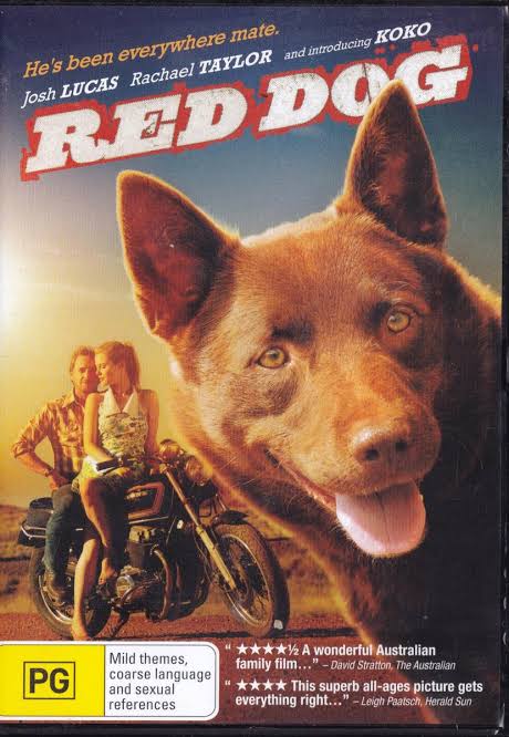 DVD cover for the film 'Red Dog' featuring a red dog in the foreground, two people riding a motorcycle in the background, and the title 'RED DOG' at the top.